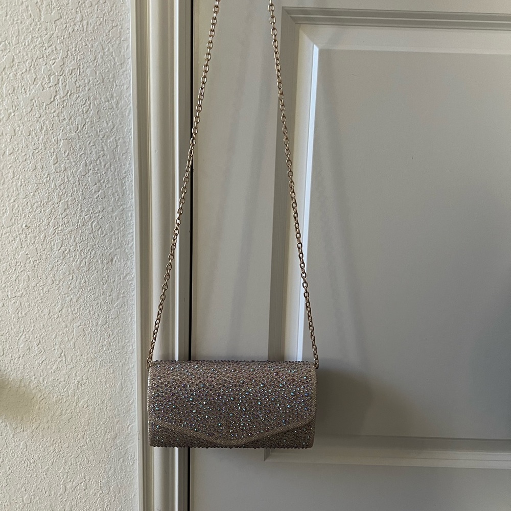 Beautiful Beaded Clutch with Gold and an additional Silver Chain.